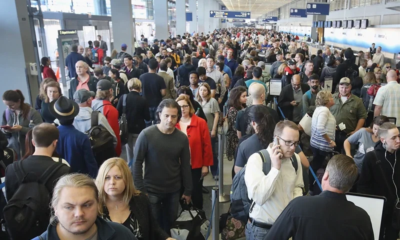 As Long Lines In Airports Rise, TSA Struggles To Cut Waiting Times CHICAGO, IL - MAY 16: Passengers at O'Hare International Airport wait in line to be screened at a Transportation Security Administration (TSA) checkpoint on May 16, 2016 in Chicago, Illinois. Waiting times at the checkpoints today have been reported to be as long 2 hours. The long lines have been blamed for flight delays and a large number of passengers missing flights completely. (Photo by Scott Olson/Getty Images)
