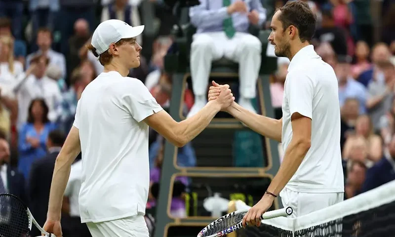 Russia's Daniil Medvedev shakes hands with Italy's Jannik Sinner after winning their quarter final match REUTERS/Paul Childs