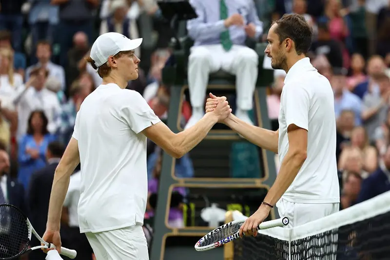 Russia's Daniil Medvedev shakes hands with Italy's Jannik Sinner after winning their quarter final match REUTERS/Paul Childs