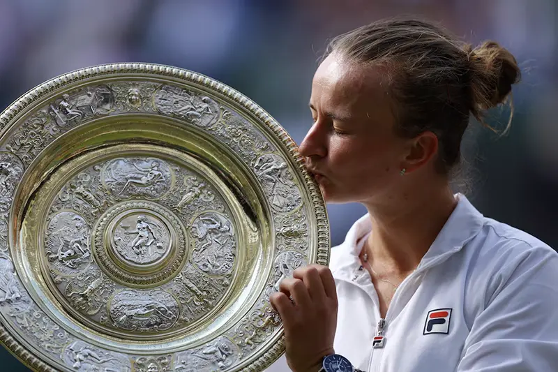 Czech Republic's Barbora Krejcikova celebrates with the trophy after winning her final against Italy's Jasmine Paolini REUTERS/Matthew Childs