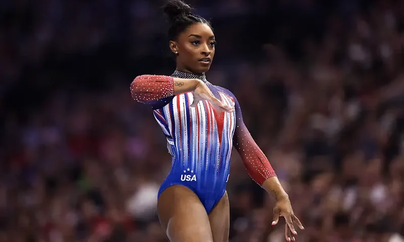 Simone Biles competes on the beam during the U.S. Olympic Team Gymnastics Trials at Target Center. Mandatory Credit: Matt Krohn-USA TODAY Sports