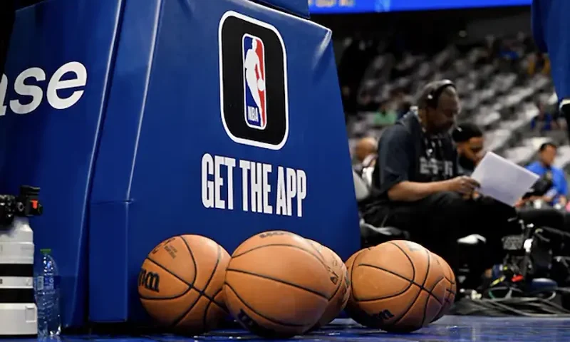 A view of the NBA logo and basketballs during warms up before the game between the Dallas Mavericks and the Suns at the American Airlines Center. /Jerome Miron-USA TODAY Sports/File Photo