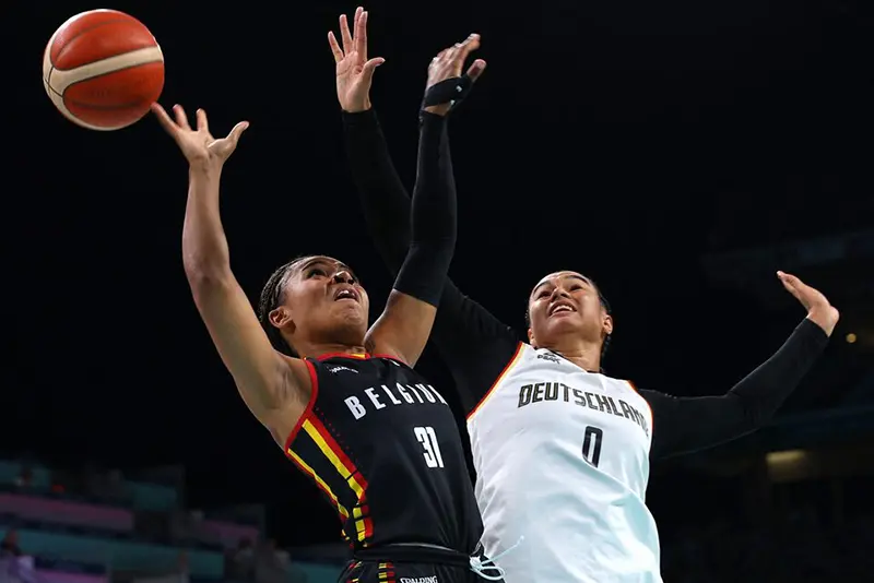 Maxuella Lisowa Mbaka of Belgium in action against Satou Sabally of Germany REUTERS/Brian Snyder