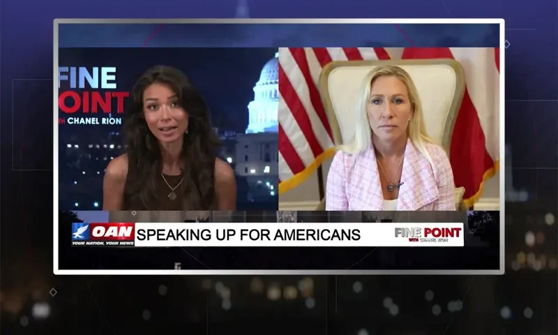 Video still from Fine Point on One America News Network showing a split screen of the host on the left side, and on the right side is the guest, Marjorie Taylor Greene.