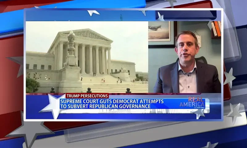 Video still from Real America on One America News Network during an interview with the guest, Jesse Binnall.