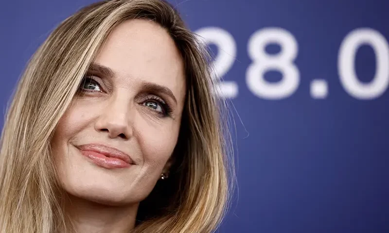 Cast member Angelina Jolie poses during a photocall for the movie "Maria", in competition, at the 81st Venice Film Festival, Venice, Italy, August 29, 2024. REUTERS/Yara Nardi