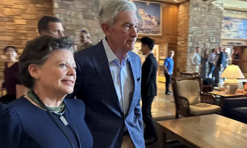Federal Reserve Chair Jerome Powell heads into the opening dinner at the Kansas City Fed’s annual economic symposium in Jackson Hole, Wyoming on August 22, 2024. REUTERS/Ann Saphir/File Photo