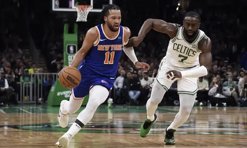 New York Knicks guard Jalen Brunson (11) controls the ball while Boston Celtics guard Jaylen Brown (7) defends during the first half at TD Garden. Mandatory Credit: Bob DeChiara-USA TODAY Sports/File Photo
