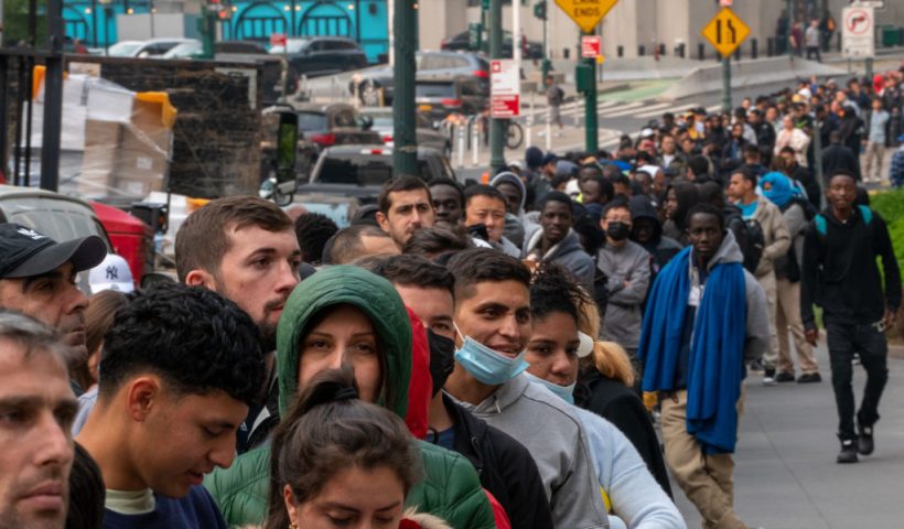 NEW YORK, NEW YORK - JUNE 6:Hundreds of asylum seekers line up outside of the Jacob K. Javits Federal Building on June 6, 2023 in New York City. New York City has provided sanctuary to over 46,000 asylum seekers since 2013, when the city passed a law prohibiting city agencies from cooperating with federal immigration enforcement agencies unless there is a warrant for the person's arrest.(Photo by David Dee Delgado/Getty Images)
