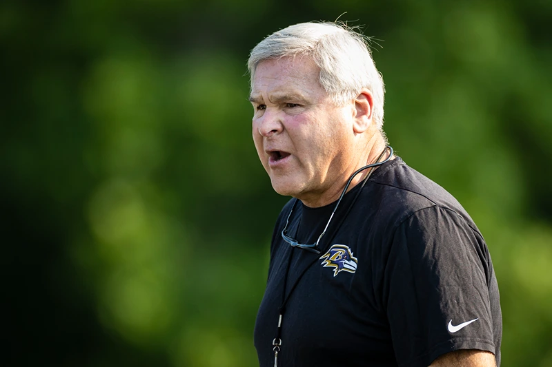 OWINGS MILLS, MD - JULY 28: Offensive line coach Joe D"u2019Alessandris instructs players during training camp at Under Armour Performance Center Baltimore Ravens on July 28, 2021 in Owings Mills, Maryland. (Photo by Scott Taetsch/Getty Images)