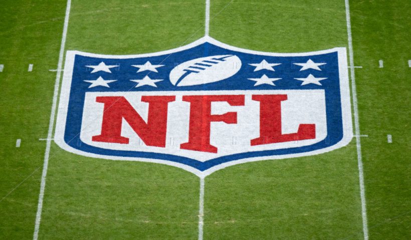 MUNICH, GERMANY - NOVEMBER 13: The NFL logo is painted on the field prior to the NFL match between Seattle Seahawks and Tampa Bay Buccaneers at Allianz Arena on November 13, 2022 in Munich, Germany. (Photo by Sebastian Widmann/Getty Images)