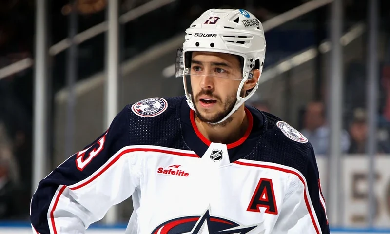 ELMONT, NEW YORK - DECEMBER 29: Johnny Gaudreau #13 of the Columbus Blue Jackets skates against the New York Islanders at the UBS Arena on December 29, 2022 in Elmont, New York. (Photo by Bruce Bennett/Getty Images)