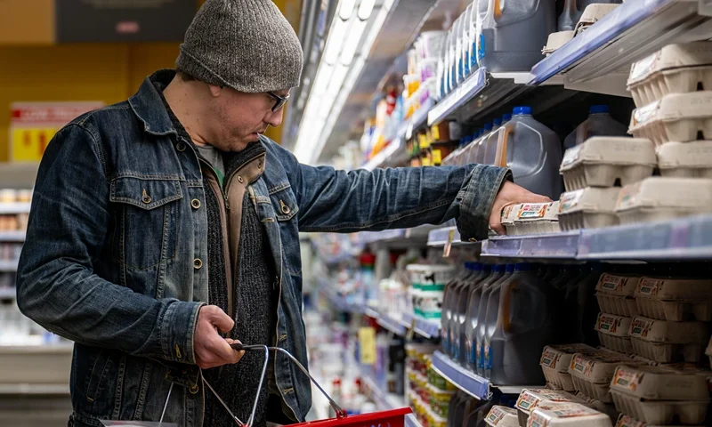 AUSTIN, TEXAS - FEBRUARY 08: A customer shops for eggs at a H-E-B grocery store on February 08, 2023 in Austin, Texas. Wholesale egg prices have begun declining more than 50% since December record highs according to Urner Barry data. (Photo by Brandon Bell/Getty Images)
