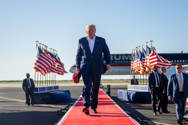 WACO, TEXAS - MARCH 25: Former U.S. President Donald Trump arrives during a rally at the Waco Regional Airport on March 25, 2023 in Waco, Texas. Former U.S. president Donald Trump attended and spoke at his first rally since announcing his 2024 presidential campaign. Today in Waco also marks the 30 year anniversary of the weeks deadly standoff involving Branch Davidians and federal law enforcement. 82 Davidians were killed, and four agents left dead. (Photo by Brandon Bell/Getty Images)