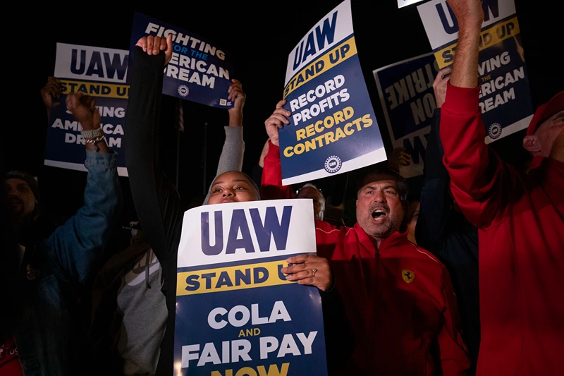 United Auto Workers Hold Limited Strikes As Contract Negotiations Expire
WAYNE, MICHIGAN - SEPTEMBER 15: Supporters and workers cheer as United Auto Workers members go on strike at the Ford Michigan Assembly Plant on September 15, 2023 in Wayne, Michigan. Contract negotiations with the Big Three auto makers Ford, General Motors, and Stellantis expired at 11:59pm September 14. This is the first time in history that the UAW is striking all three of the Big Three auto makers at the same time. (Photo by Bill Pugliano/Getty Images)