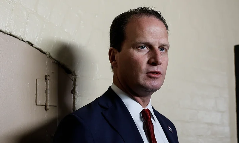 WASHINGTON, DC - SEPTEMBER 27: Rep. August Pfluger (R-TX) speaks to reporters outside of a House Republican caucus meeting at the U.S. Capitol on September 27, 2023 in Washington, DC. House Speaker Kevin McCarthy (R-CA) continues to have difficulty finding a legislative path that would prevent the federal government from partially shutting down at midnight on September 30 while also preserving his speakership. (Photo by Anna Moneymaker/Getty Images)