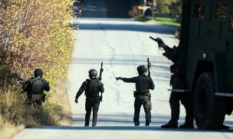 MONMOUTH, MAINE - OCTOBER 27: Law enforcement officials conduct a manhunt for suspect Robert Card following a mass shooting on October 27, 2023 in Monmouth, Maine. Police are actively searching for a suspect, Army reservist Robert Card, who allegedly killed 18 people in a mass shooting at a bowling alley and restaurant in Lewiston, Maine. (Photo by Joe Raedle/Getty Images)