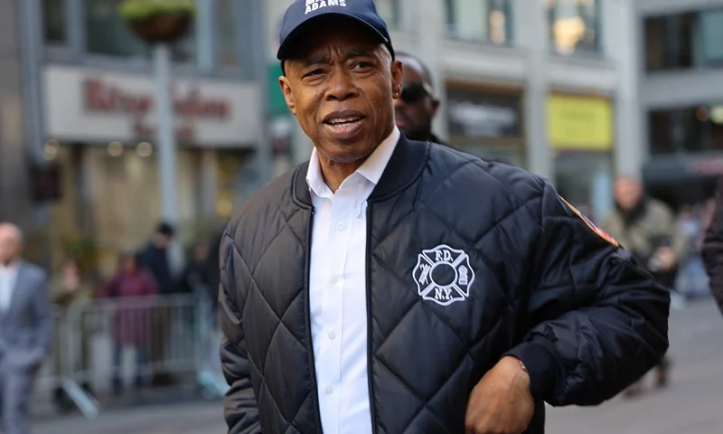 NEW YORK, NEW YORK - NOVEMBER 11: New York Mayor Eric Adams participates in the annual Veterans Day Parade on November 11, 2023 in New York City. Adams recently had his phone and iPad seized by the FBI as they investigated campaign funding in his administration. Hundreds of people lined 5th Avenue to watch the biggest Veterans Day parade in the United States. This year's event included veterans, active soldiers, police officers, firefighters, and dozens of school groups participating in the parade which honors the men and women who have served and sacrificed for the country (Photo by Spencer Platt/Getty Images)