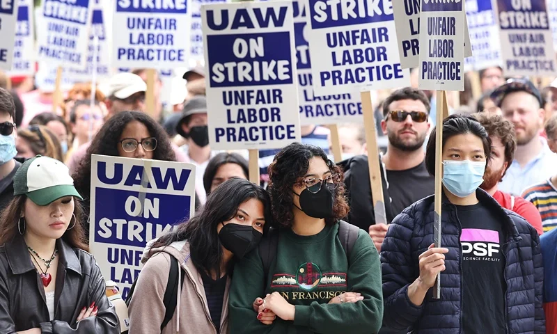 UCLA (University of California, Los Angeles) academic workers from United Auto Workers Local 4811 rally on the first day of their strike on May 28, 2024 in Los Angeles, California. The academic workers are striking over the law enforcement response at various University of California pro-Palestinian campus protests. Unionized academic workers at UC Davis and UC Santa Cruz are also now on strike. (Photo by Mario Tama/Getty Images)