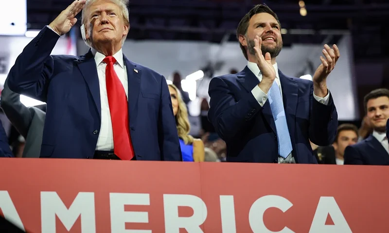 MILWAUKEE, WISCONSIN - JULY 15: Republican presidential candidate, former U.S. President Donald Trump (L) and Republican vice presidential candidate, U.S. Sen. J.D. Vance (R-OH) appear on the first day of the Republican National Convention at the Fiserv Forum on July 15, 2024 in Milwaukee, Wisconsin. Delegates, politicians, and the Republican faithful are in Milwaukee for the annual convention, concluding with former President Donald Trump accepting his party's presidential nomination. The RNC takes place from July 15-18. (Photo by Joe Raedle/Getty Images)