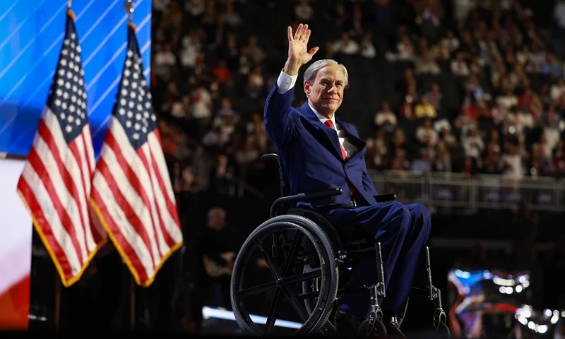 MILWAUKEE, WISCONSIN - JULY 17: Texas Gov. Greg Abbott waves on stage on the third day of the Republican National Convention at the Fiserv Forum on July 17, 2024 in Milwaukee, Wisconsin. Delegates, politicians, and the Republican faithful are in Milwaukee for the annual convention, concluding with former President Donald Trump accepting his party's presidential nomination. The RNC takes place from July 15-18. (Photo by Joe Raedle/Getty Images)
