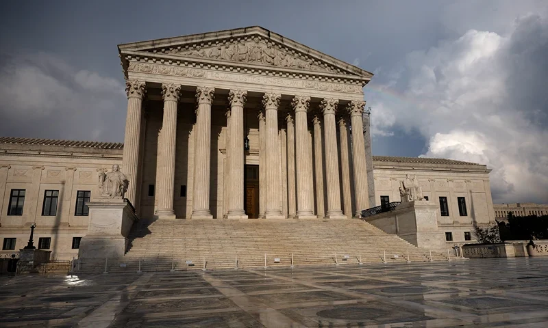 WASHINGTON, DC - JULY 30: Passing storm clouds are seen over the U.S. Supreme Court on July 30, 2024 in Washington, DC. President Biden is calling for Supreme Court reforms including term limits for the Justices, a binding code of ethics for the court and is calling on lawmakers to pass legislation limiting presidential immunity. (Photo by Kevin Dietsch/Getty Images)