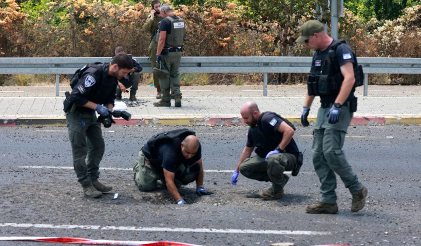 Israeli police check the site of a Hezbollah explosive drone attack near the northern city of Nahariya, on August 6, 2024, amid regional tensions during the ongoing war between Israel and the Palestinian Hamas movement in the Gaza Strip. A Lebanese security source said an Israeli strike killed five Hezbollah fighters in the south, with the group claiming attacks on northern Israel, including one with explosive drones. (Photo by Menahem KAHANA / AFP) (Photo by MENAHEM KAHANA/AFP via Getty Images)