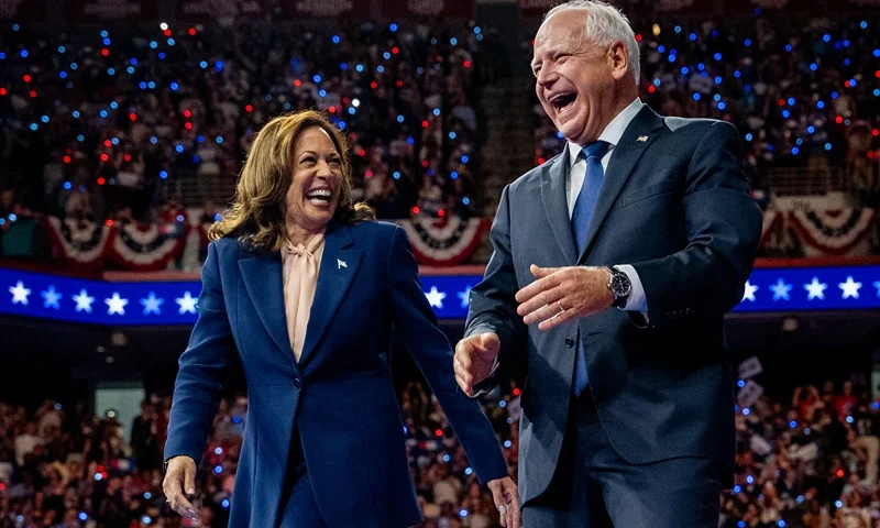 Democratic presidential candidate, U.S. Vice President Kamala Harris and Democratic vice presidential nominee Minnesota Gov. Tim Walz walk out on stage together during a campaign event on August 6, 2024 in Philadelphia, Pennsylvania. Harris ended weeks of speculation about who her running mate would be, selecting the 60 year old midwestern governor over other candidates. (Photo by Andrew Harnik/Getty Images)