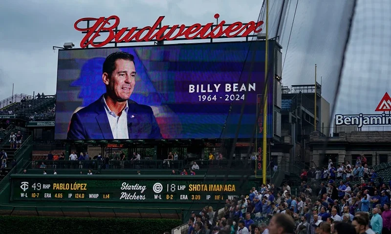 CHICAGO, ILLINOIS - AUGUST 06: The Chicago Cubs and their fans observed a moment of silence in honor of former MLB player Billy Bean prior to the game against the Minnesota Twins at Wrigley Field on August 06, 2024 in Chicago, Illinois. (Photo by Nuccio DiNuzzo/Getty Images)