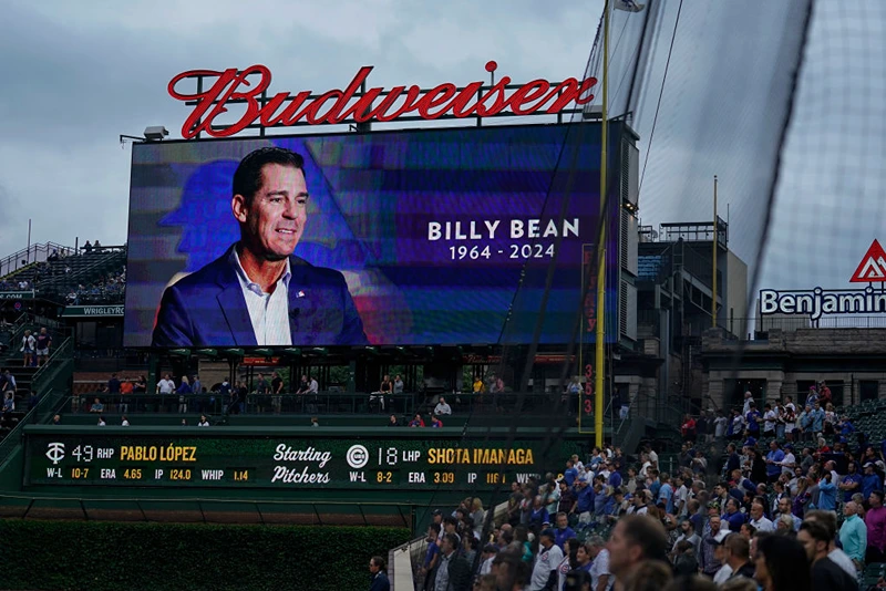 CHICAGO, ILLINOIS - AUGUST 06: The Chicago Cubs and their fans observed a moment of silence in honor of former MLB player Billy Bean prior to the game against the Minnesota Twins at Wrigley Field on August 06, 2024 in Chicago, Illinois. (Photo by Nuccio DiNuzzo/Getty Images)