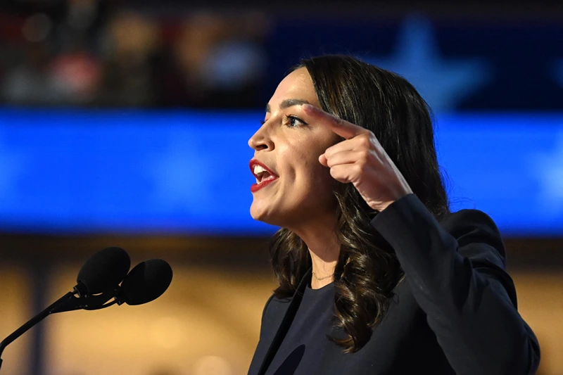 US Representative Alexandria Ocasio-Cortez (D-NY) speaks on the first day of the Democratic National Convention (DNC) at the United Center in Chicago, Illinois, on August 19, 2024. Vice President Kamala Harris will formally accept the party's nomination for president at the DNC which runs from August 19-22 in Chicago. (Photo by ANDREW CABALLERO-REYNOLDS / AFP) (Photo by ANDREW CABALLERO-REYNOLDS/AFP via Getty Images)