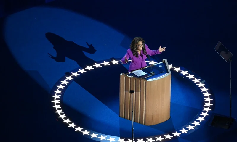 TOPSHOT - US television host and producer Oprah Winfrey speaks on the third day of the Democratic National Convention (DNC) at the United Center in Chicago, Illinois, on August 21, 2024. Vice President Kamala Harris will formally accept the party's nomination for president at the DNC which runs from August 19-22 in Chicago. (Photo by Eva HAMBACH / AFP) (Photo by EVA HAMBACH/AFP via Getty Images)