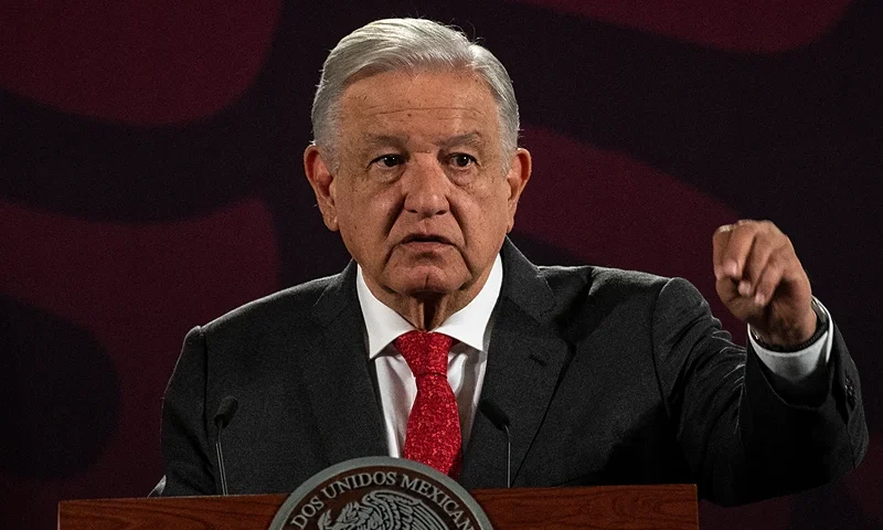 Mexico's President Andres Manuel Lopez Obrador gestures while speaking during his daily early morning press conference at the National Palace in Mexico City on August 23, 2024. Mexico sent a diplomatic note to the United States to protest the "interfering statement" of its ambassador, Ken Salazar, regarding the judicial reform being discussed in the country, informed President Andrés Manuel López Obrador this Friday. (Photo by Yuri CORTEZ / AFP) (Photo by YURI CORTEZ/AFP via Getty Images)