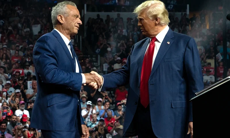 Former Republican presidential candidate Robert F. Kennedy Jr. and Republican presidential nominee, former U.S. President Donald Trump shake hands during a campaign rally at Desert Diamond Arena on August 23, 2024 in Glendale, Arizona. Kennedy announced today that he was suspending his presidential campaign and supporting former President Trump. (Photo by Rebecca Noble/Getty Images)