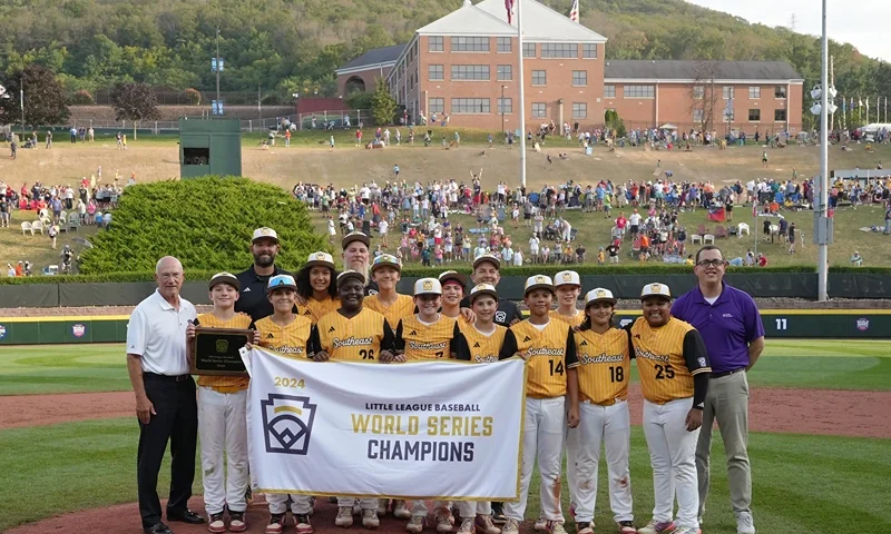 Southeast Region team from Lake Mary, Florida poses for photos after beating the Asia-Pacific Region team from Taoyuan Ciy, Chinese Taipei 2-1 to win the Little League World Series Championship Game at Howard J. Lamade Stadium on August 25, 2024 in South Williamsport, Pennsylvania. (Photo by Dylan Buell/Getty Images)