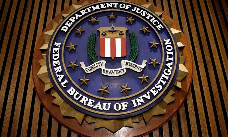 WASHINGTON - MARCH 09: The seal of the F.B.I. hangs in the Flag Room at the bureau's headquaters March 9, 2007 in Washington, DC. F.B.I. Director Robert Mueller was responding to a report by the Justice Department inspector general that concluded the FBI had committed 22 violations in its collection of information through the use of national security letters. The letters, which the audit numbered at 47,000 in 2005, allow the agency to collect information like telephone, banking and e-mail records without a judicially approved subpoena. (Photo by Chip Somodevilla/Getty Images)