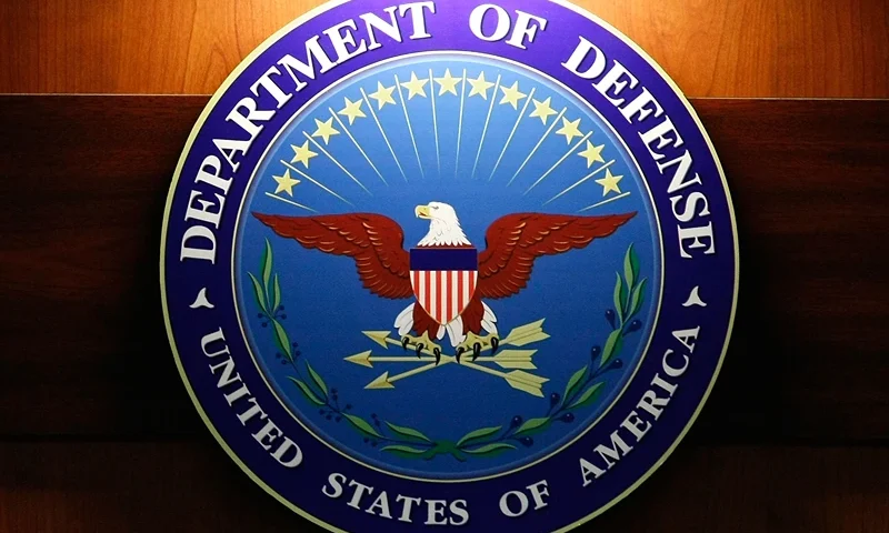 A light shines on the seal of the Department of Defense during a briefing at the Pentagon, September 27, 2007 in Arlington, Virginia. Today was Chairman of the Joint Chiefs of Staff Gen. Peter Pace's last official day as Joint Chief Chairman. (Photo by Mark Wilson/Getty Images)