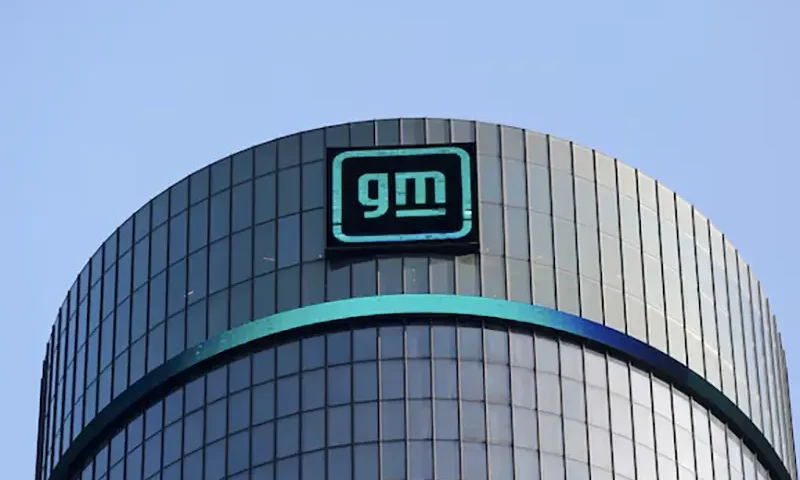The GM logo is seen on the facade of the General Motors headquarters in Detroit, Michigan, U.S., March 16, 2021. REUTERS/Rebecca Cook/File Photo