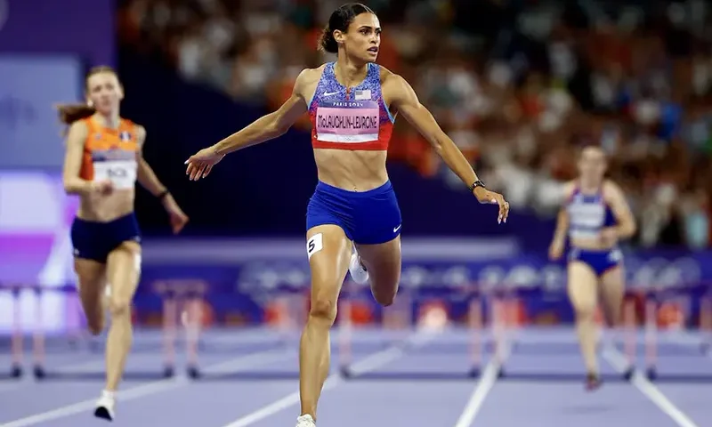 Sydney McLaughlin-Levrone of United States crosses the line to win gold and set a new world record. REUTERS/Sarah Meyssonnier