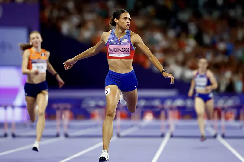 Sydney McLaughlin-Levrone of United States crosses the line to win gold and set a new world record. REUTERS/Sarah Meyssonnier