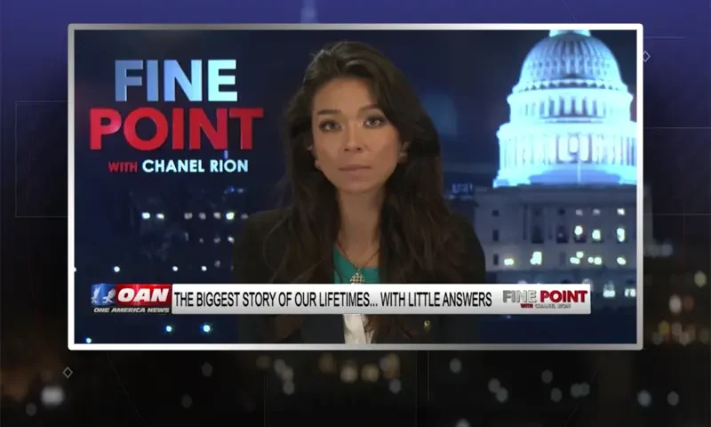 Video still of the host of Fine Point at the desk of their talk show on One America News Network.