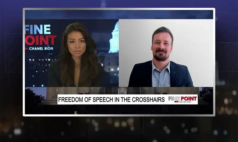 Video still from Fine Point on One America News Network showing a split screen of the host on the left side, and on the right side is the guest, John Matze.