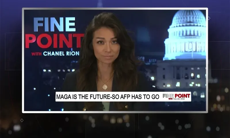 Video still of the host of Fine Point at the desk of their talk show on One America News Network.