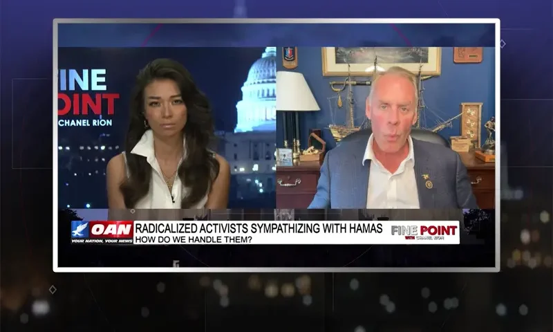 Video still from Fine Point on One America News Network showing a split screen of the host on the left side, and on the right side is the guest, Ryan Zinke.