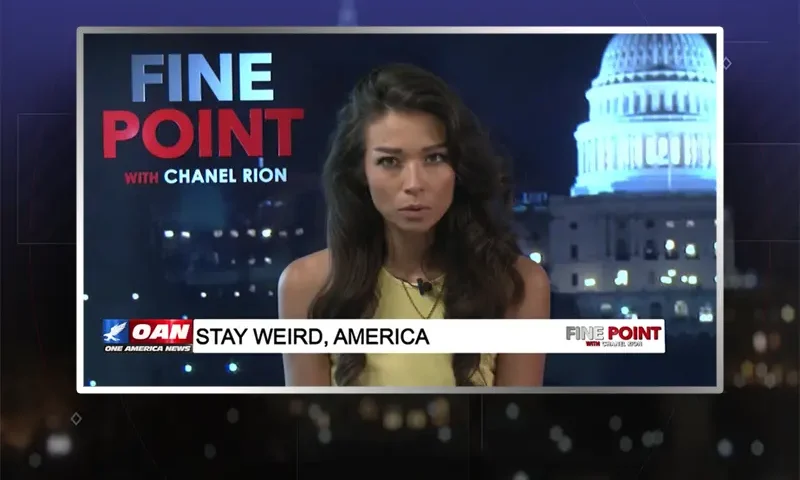Video still of the host of Fine Point at the desk of their talk show on One America News Network.