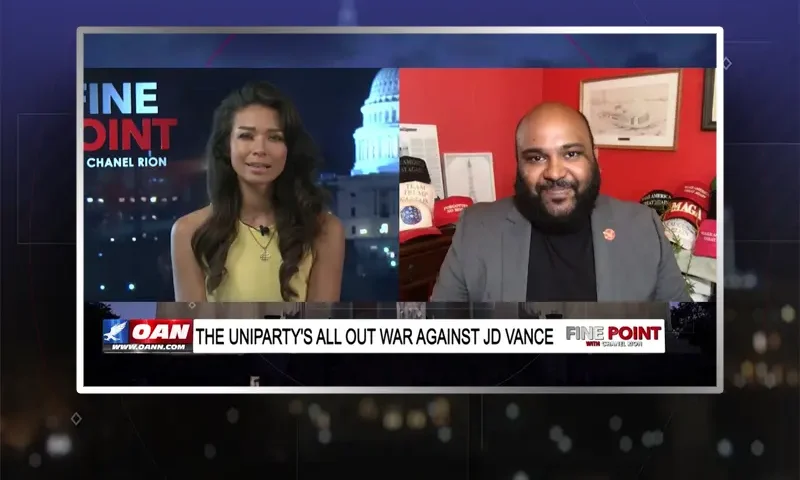 Video still from Fine Point on One America News Network showing a split screen of the host on the left side, and on the right side is the guest, Vish Burra.