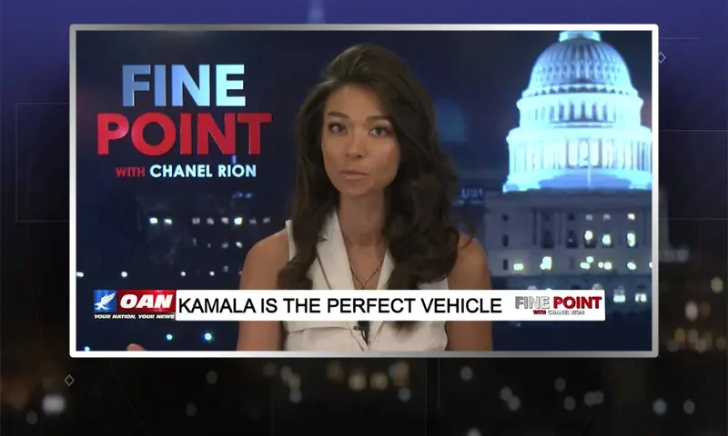 Video still of the host of Fine Point at the desk of their talk show on One America News Network.