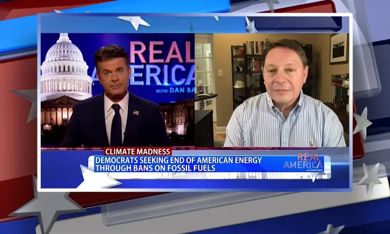 Video still from Real America on One America News Network showing a split screen of the host on the left side, and on the right side is the guest, Steve Milloy.