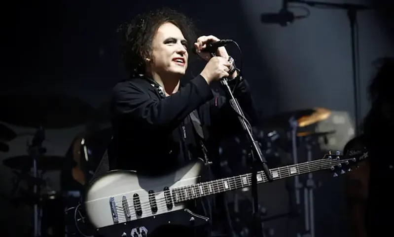 Robert Smith of the British band The Cure performs the Pyramid Stage closing set during Glastonbury Festival in Somerset, Britain June 30, 2019. REUTERS/Henry Nicholls/File Photo