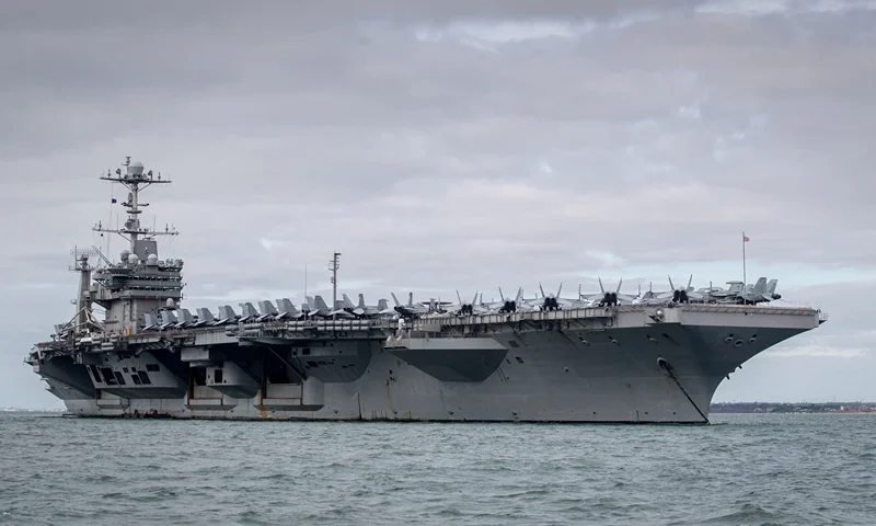 PORTSMOUTH, ENGLAND - OCTOBER 08: The US warship USS Harry S. Truman is pictured anchored in The Solent on October 8, 2018 near Portsmouth, England. The nuclear powered aircraft carrier, named after the 33rd President of the United States with a crew of more than 5,000, has been at sea since late August and has been on operations in the North Atlantic, Mediterranean and Arabian Gulf. The Nimitz-class ship, launched in 1998 and carries more than 70 helicopters and fixed-wing aircraft, arrived in The Solent on Saturday for a five-day stay. (Photo by Matt Cardy/Getty Images)